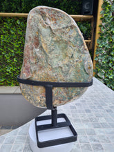 Load image into Gallery viewer, Amethyst on spinning stand with Calcite from Uruguay - Spinning reflection Active