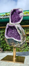 Load image into Gallery viewer, Amethyst spinning infinite 8 rare and unique - deep purple colour gold stand