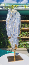 Load image into Gallery viewer, Blue Kyanite on gold custom made stand
