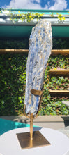 Load image into Gallery viewer, Blue Kyanite on gold custom made stand
