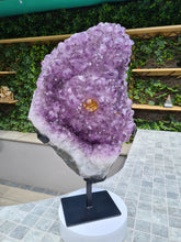 Load image into Gallery viewer, Amethyst with a heartbeat from Uruguay - With Orange red Calcite - Heartbeat Active
