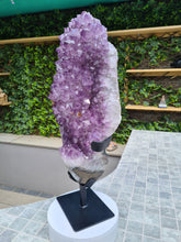 Load image into Gallery viewer, Amethyst with a heartbeat from Uruguay - With Orange red Calcite - Heartbeat Active
