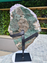 Load image into Gallery viewer, Amethyst with a heartbeat from Uruguay - With Orange red Calcite - Heartbeat Active
