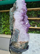 Load image into Gallery viewer, Amethyst with a heartbeat from Uruguay - With Orange red Calcite - Heartbeat Active

