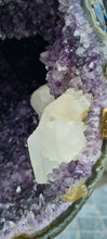 Load image into Gallery viewer, Amethyst spinning infinite 8 rare and unique with hidden Calcite - deep purple colour gold stand
