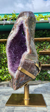 Load image into Gallery viewer, Huge Amethyst spinning almost 2ft tall polished turtle like shell double sided rare and unique - deep purple colour gold stand Active
