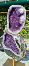 Load image into Gallery viewer, Amethyst spinning infinite 8 rare and unique - deep purple colour gold stand

