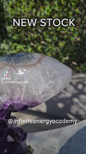 Load and play video in Gallery viewer, Amethyst Moon on gold stand
